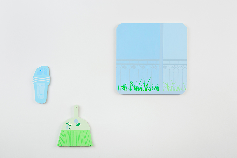 Pastel blue slide slipper, next to a pastel green hand broom, and pastel blue window with blades of bright green grass coming from the bottom.