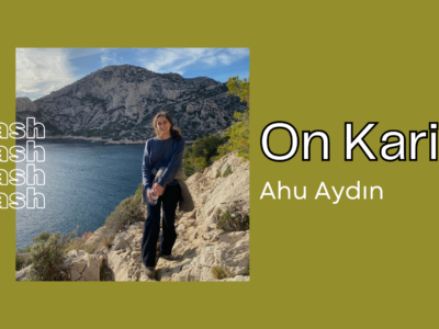 A horizontal green rectangular graphic with an image of the writer in front of mountains and a body of water. To the write, the title in large white letters outlined in black, and the writers name below. To the left, in white outlined bubble letters, 